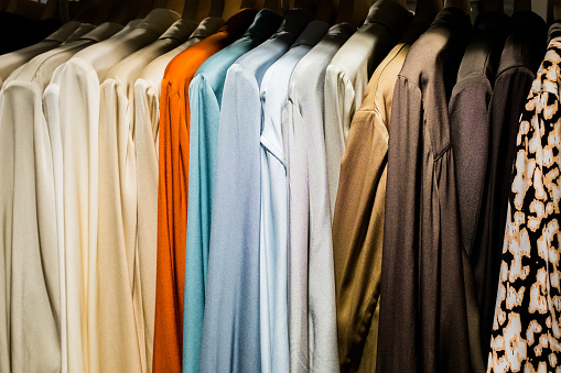 Closet full of women's silk outerwear