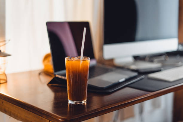 istock iced coffee on desk at home 1469913756