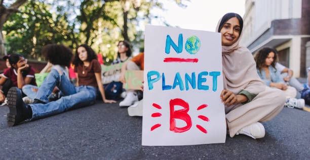 istock Happy Muslim girl protesting against climate change 1469915539