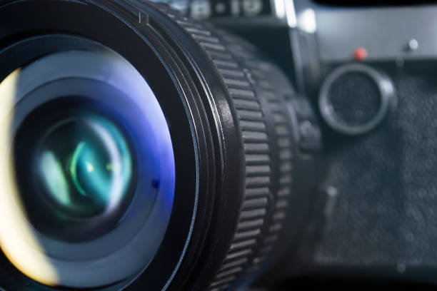 istock camera and photo lens close up 1469920138