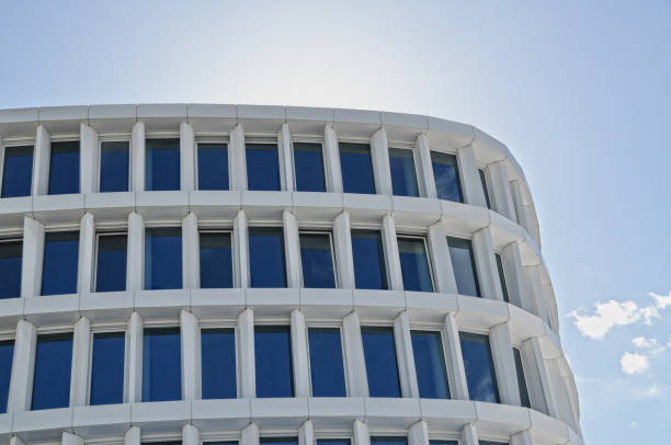istock modern white building exterior symetric windows in a row modern architecture 1469921411