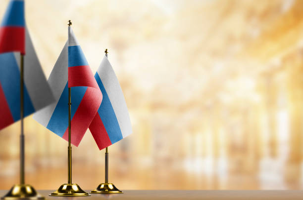 istock Small flags of the Russia on an abstract blurry background 1469922290