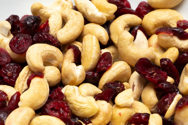 istock Bowl of cashews and cranberries 1469924315