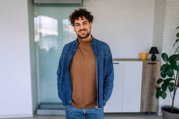 istock Young handsome casually clothed man posing for a shot 1469938326