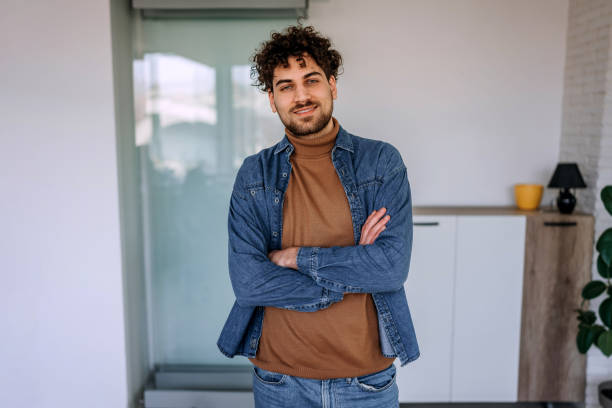istock Young handsome casually clothed man posing for a shot 1469938356
