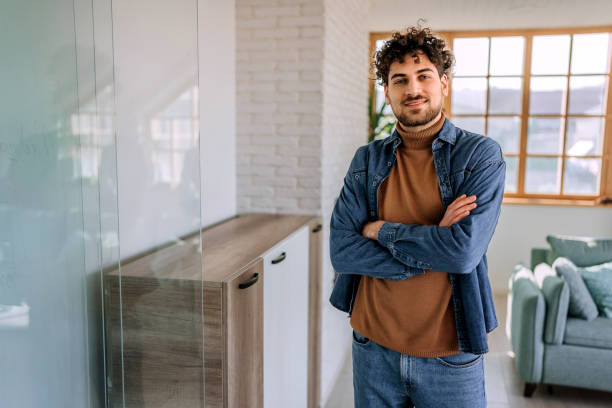 istock Young handsome casually clothed man posing for a shot 1469938357