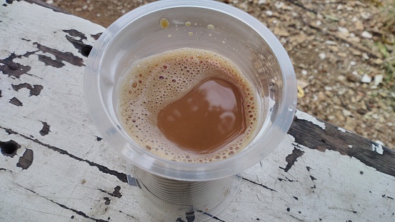 a cup of coffee milk ready to drink