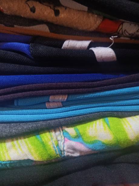 istock A pile of assorted ironed and folded clothes 1469939948