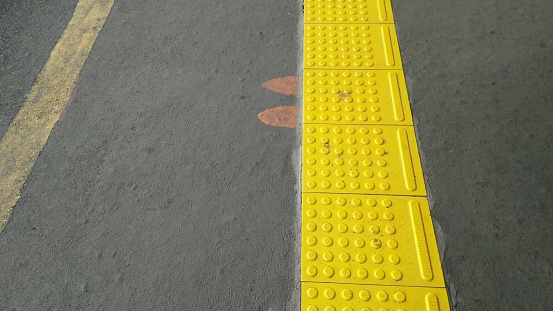 signs for blind people provided in public spaces