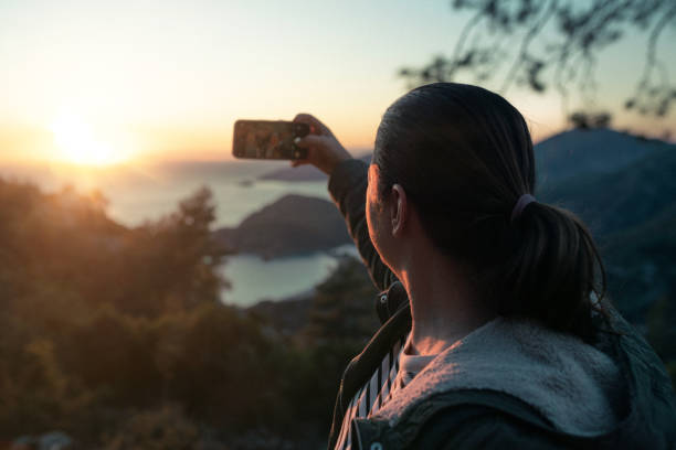istock Shooting mountains and sea at sunset 1469942515
