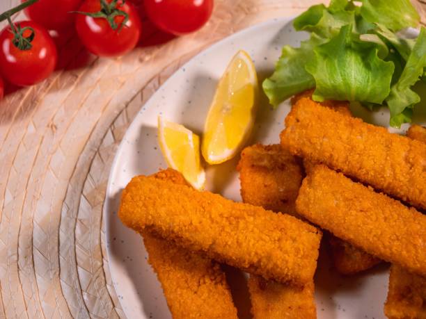 istock fish sticks, Fast finger food. top view. 1469945353