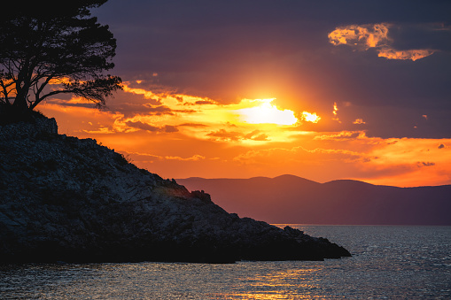 View from Hvar island on Biokovo mountain range at sunset (Croatia).