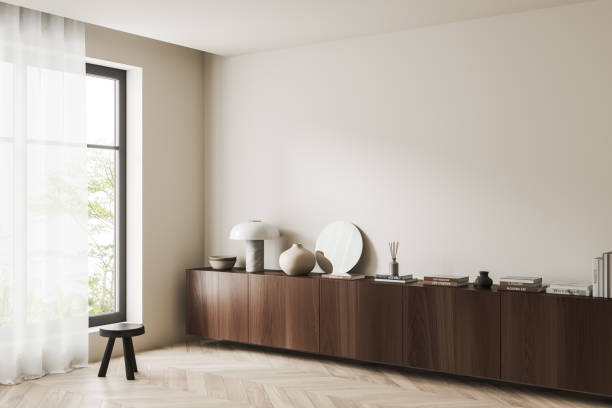 istock Light gallery room interior with dresser and decoration. Mockup empty wall 1469950736
