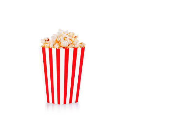 istock Glass with popcorn on a white background 1469954435