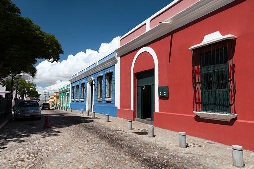 Exterior view of colourful houses in historic centre of Ciudad Bolivar, Bolivar State, Venezuela.