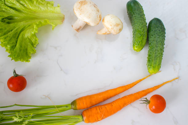 istock vegetables and mushrooms laid out on a marble top 1469955201