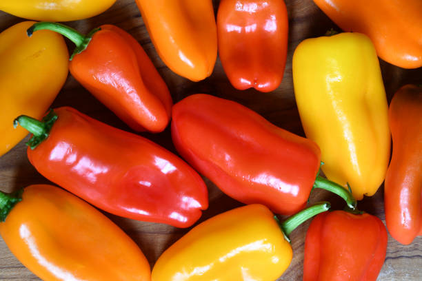 istock Close up on red and yellow peppers. view from above. 1469956470