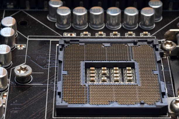 istock Detail of a CPU Socket on a Modern PC Motherboard. Printed Circuit Board - Computer Motherboard with Components. Close-up 1469956768