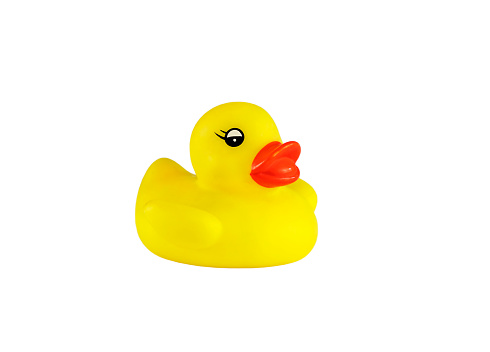 Yellow rubber duck bath toy isolated on white