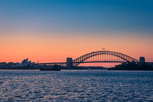 A clear day in Sydney, Australia, and this is the view from the Manly Ferry of one of the city's greatest landmarks, the famous Harbour Bridge.