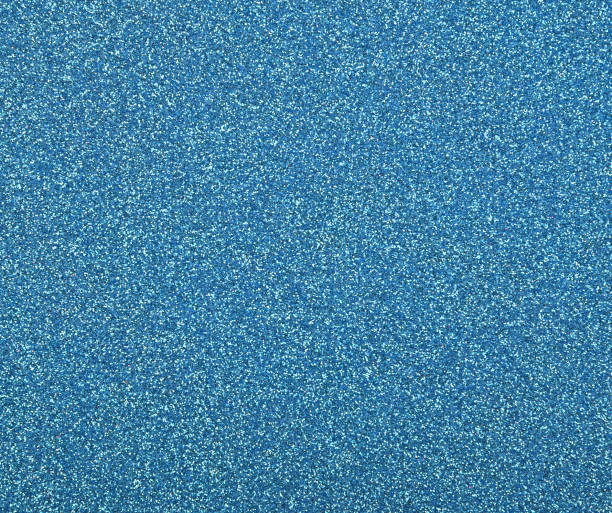 istock Abstract background texture of blue glitter 1469961997