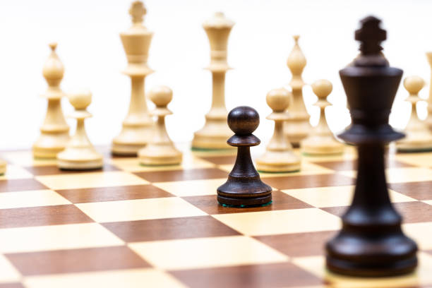 istock black pawn and single queen against white chess 1469967475