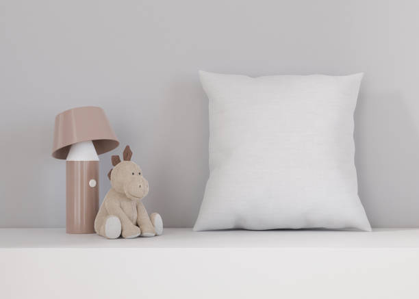 istock White square pillow in kids room. Blank cushion case template for your graphic design presentation. Pillow cover mock up for print, pattern, personalized illustration. Close-up. 3D rendering. 1469968766