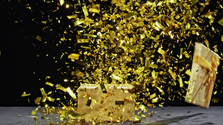 LD Confetti bursting out of a golden glittery box