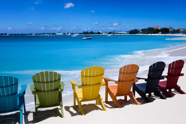 istock Colorful  chairs on a white sand Caribbean coast 1469969078