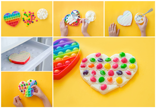 Use the popular pop it toy as a chocolate mold. White chocolate, colorful candies and popit heart-shaped silicone mold on yellow background. DIY concept. Step-by-step photo instructions. Collage
