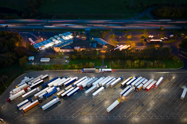 Highway and rest area at dusk - aerial view