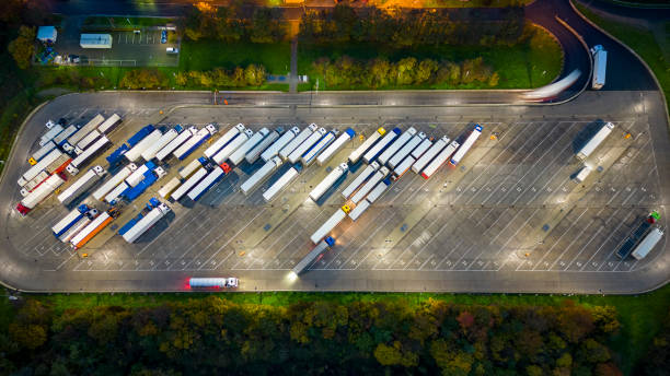 istock Highway and rest area at dusk - aerial view 1469971274
