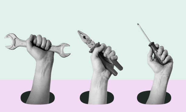 istock Art collage of hands with tools on a surrealistic background. 1469974295