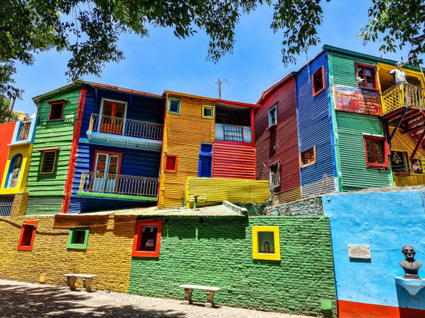 Colorful buildings in Caminito street in La Boca at Buenos Aires, Argentina. Colorful buildings in Caminito street in La Boca neighborhood at Buenos Aires, Argentina. It was a port area where Tango was born, now tourist destination with colorful houses and pedestrian stree la boca stock pictures, royalty-free photos & images