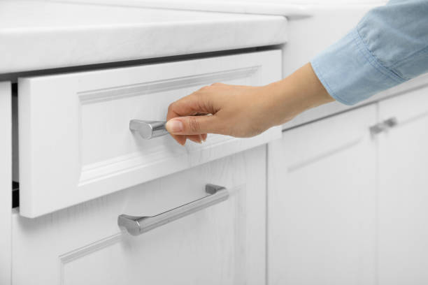 istock Woman opening drawer at home, closeup view 1469974505