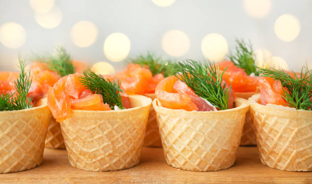istock Snack with red fish on the board. Festive snack. Menu for the festive table. Side view. Copy space. 1469976808