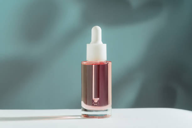 istock pink face and hair oil on blue backlit background 1469978349