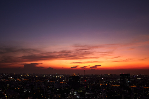 Sunset over Bangkok skyline with beautiful red colors