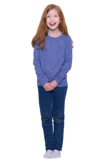 istock Redhead girl standing with her hands clasped in front 1469980028