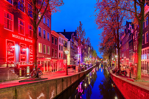 Amsterdam, Netherlands - April 21, 2022: Amsterdam's Red-light district. It is one of the main tourist attractions