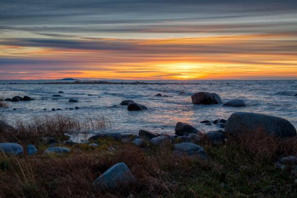 istock Coast line with waves at the baltic sea 1469980111