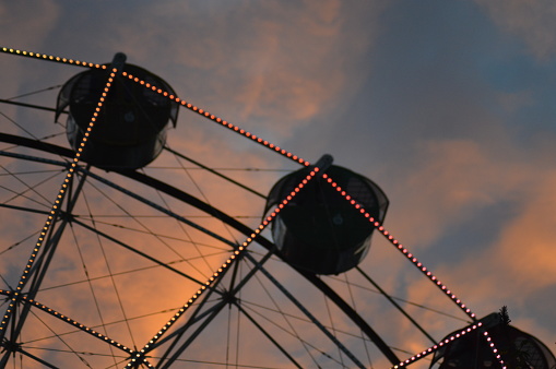 Ferris wheel light in golden hour