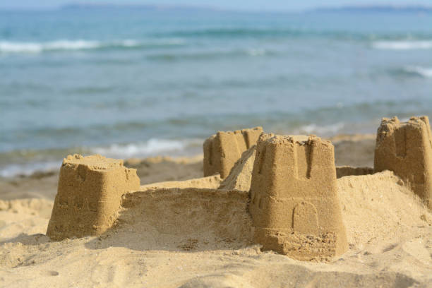 istock Beautiful sand castle on beach near sea 1469982223