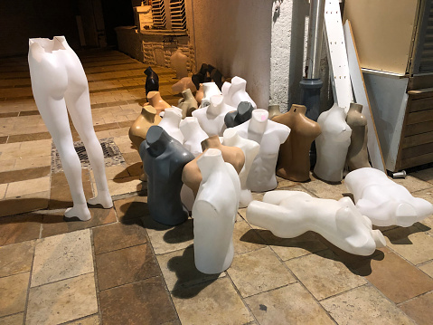 Abandoned mannequins on street