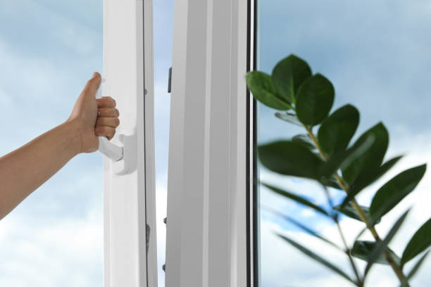 istock Woman opening white plastic window indoors, closeup 1469987470