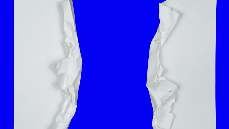 Paper Folding Stop Motion, 4k Paper Animation on a Blue Screen with Alpha Channel. Transforming Paper Blank Sheet to Ball, Paper Sheets Tearing from the Center Opening the Screen Transition