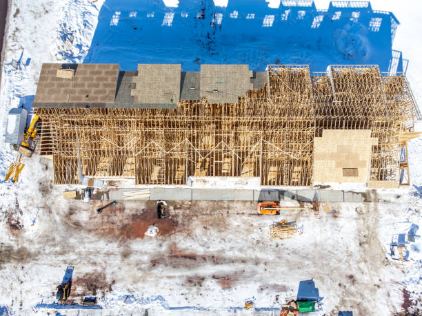 istock Aerial drone view of a multifamily apartment complex under construction. 1469992527