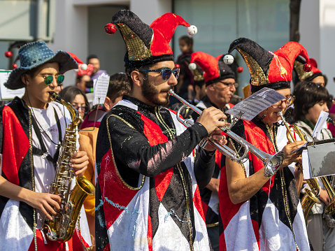 Limassol, Cyprus, February 26th, 2023: Brass band in carnival costumes taking part in the Grand Carnival Parade