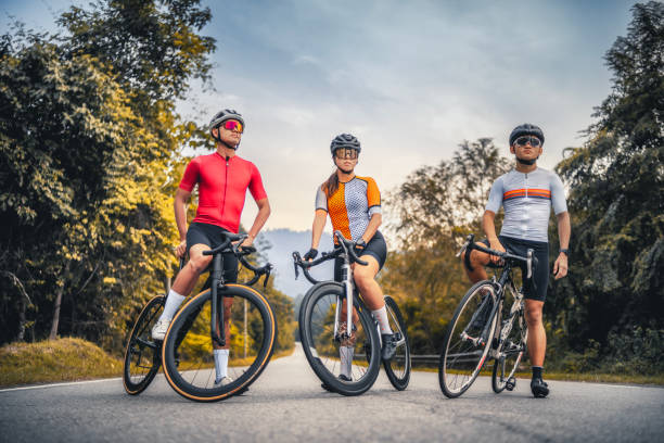 portrait asian chinese cyclist in rural scene - road cycling imagens e fotografias de stock