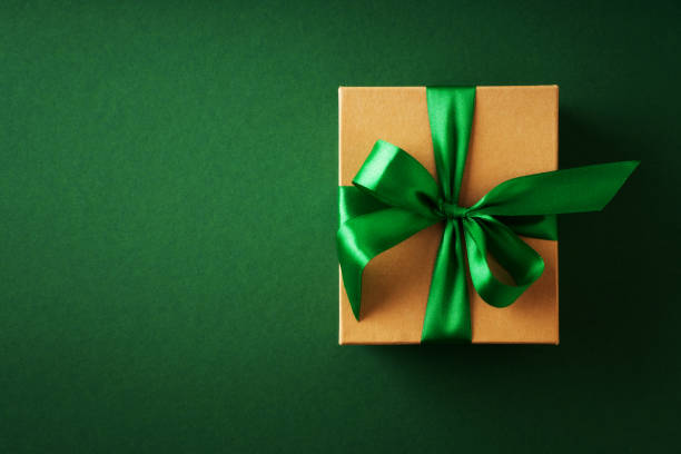 istock Saint Patrick day concept flat lay with gift box close up on green background 1469995594